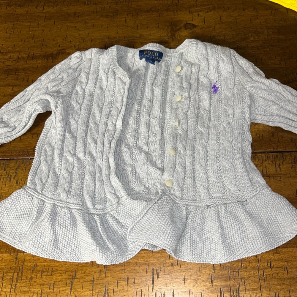 Worned polo sweater